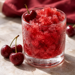 Granité rouge cerise en gros plan, avec des cerises — illustration du parfum